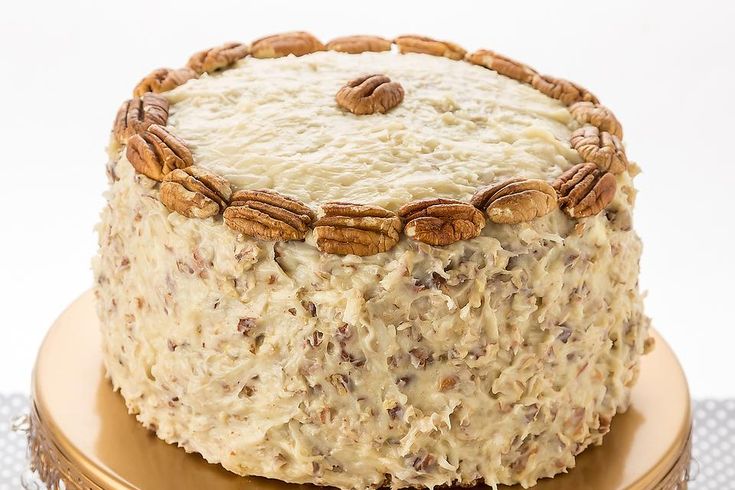 there is a cake that has pecans on it