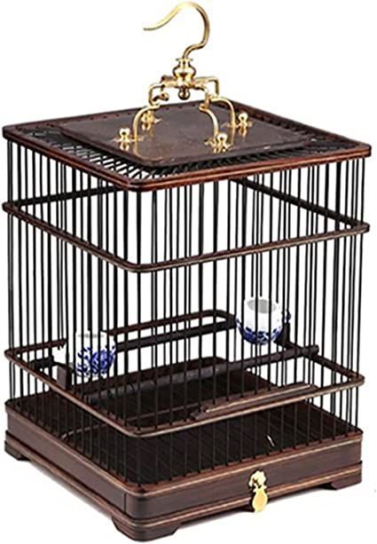 a bird cage with two birds in it