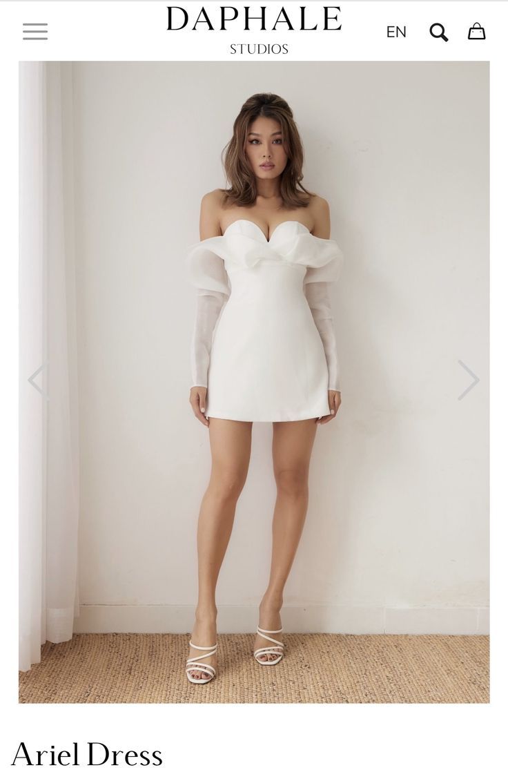 a white dress with ruffles on the shoulders is featured in an article about how to wear it