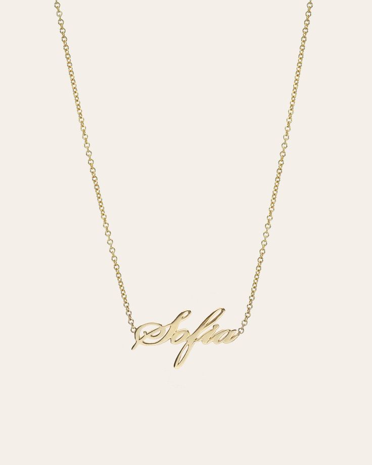 14k solid gold ID dainty name necklace in our beautiful script font, hanging from a chain length of your choice. For a heart symbol please enter ''(heart)''. Please note that the personalization box is case sensitive, so type in exactly how you would like your name to appear, with the correct upper/lowercase font. Script font is not offered in all capitalization. If you are interested in an ID necklace with more than 10 characters, please email us at info@zoelev.com for a quote. Letter Height: A Personalized Elegant Heart Pendant Name Necklace, Engraved Name Necklace As Personalized Fine Jewelry Gift, Engraved Name Necklace As Personalized Gift, Engraved Name Necklace For Personalized Gift, Elegant Name Necklace With Heart Pendant For Personalized Gift, Elegant Heart Pendant Name Necklace For Personalized Gift, Minimalist Name Necklace For Formal Occasions, Custom Name Signature Jewelry For Personalized Gift, Valentine's Day Elegant Custom Name Necklace