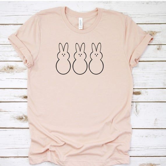 Casual T-shirt With Bunny Design And Crew Neck, Casual Crew Neck T-shirt With Bunny Design, Cute Bunny Design Crew Neck T-shirt, White Cotton T-shirt With Bunny Design, Casual Cotton T-shirt With Bunny Print, Easter Graphic Print Short Sleeve Tops, Casual Bunny Print Crew Neck Top, White Short Sleeve T-shirt With Bunny Print, Easter Graphic Print Crew Neck Top