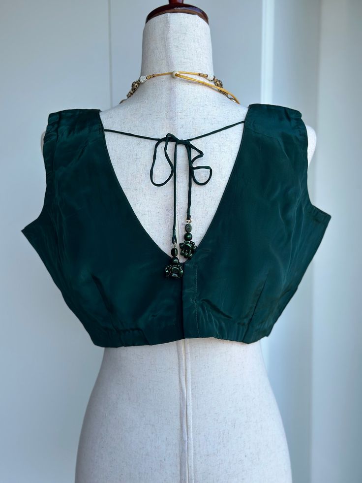 Blouse size 38-42 crape silk sleeveless blouse Elegant Silk Unstitched Blouse, Chic Green Silk Blouse, Summer Satin Sleeveless Blouse, Satin Sleeveless Party Blouse, Summer Sleeveless Satin Blouse, Elegant Sleeveless Satin Blouse, Chic Green Sleeveless Blouse, Elegant Sleeveless Unstitched Blouse, Elegant Satin Blouse Piece With Padded Blouse