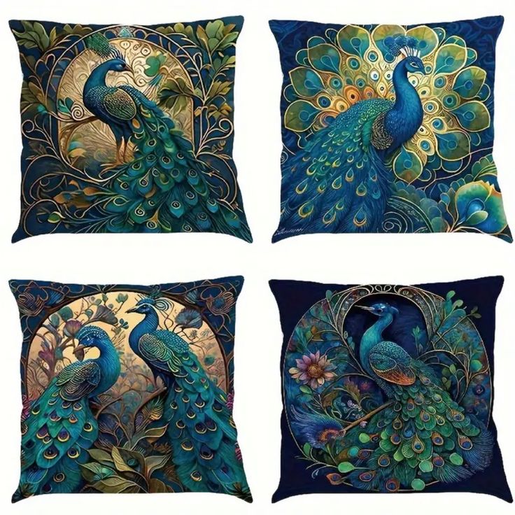 four decorative pillows with peacocks on them