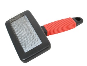 an orange and black brush on a white background