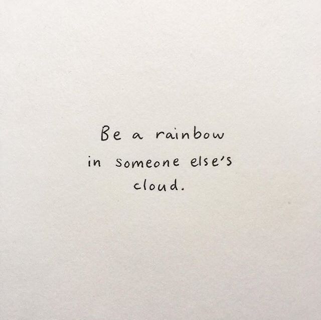 a piece of paper with the words be a rainbow in someone else's cloud