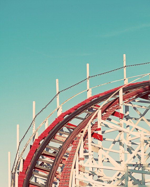 the roller coaster is red and white in color