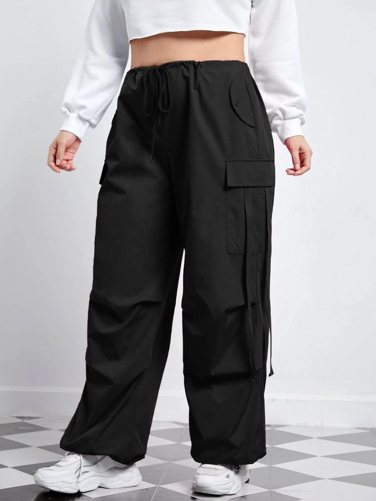 Our Flap Pocket Side Drawstring Waist Pants, you get the perfect fusion of style and comfort. Featuring flap pockets on the sides and a drawstring waist, these pants offer practicality and a modern design. The drawstring waist ensures a customized fit, while the high-quality materials provide durability and a soft feel. Whether lounging at home or going for a casual outing, these pants are a stylish choice. Details: Type: Cargo Pants Closure Type: Drawstring Waist Details: Drawstring, Pocket Wai Black Utility Pants With Drawstring, Utility Pants With Drawstring For Fall, Fall Utility Pants With Drawstring, Black High Waist Parachute Pants With Drawstring, High Waist Black Parachute Pants With Drawstring, Black High-waisted Parachute Pants With Drawstring, Full Length Pants With Drawstring, Utility Bottoms With Drawstring And Loose Fit, Solid Color Straight Cargo Pants With Drawstring