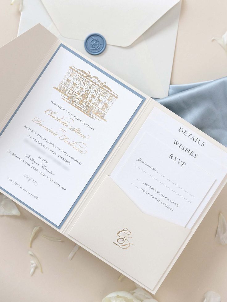 an open wedding card and envelope on a table