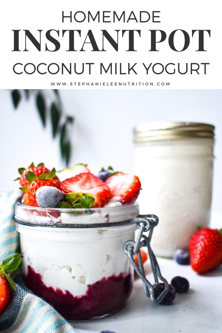 homemade instant pot coconut milk yogurt in a jar with strawberries and blueberries