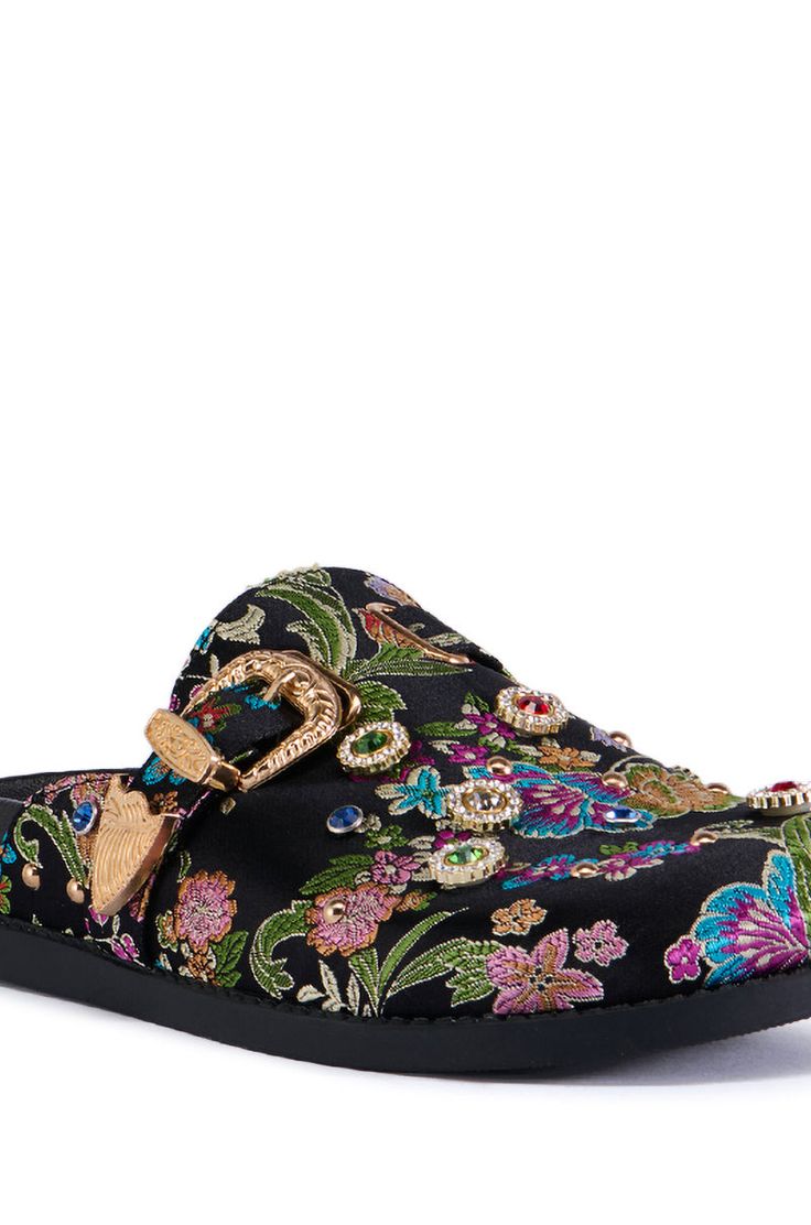 Glamorous, comfortable, chic. Meet The AZALEA WANG Quinby Brocade Clog in Black. This floral satin brocade mule features a round toe silhouette, a flat rubber outsole, faux gold metallic hardware, and an easy slip-on fit. Complete with an assortment of ornate gemstone accents, a Western-inspired adjustable belted strap accent, and flat studded embellishments.
(all measurements are approximate from size 7.5)
- Brocade Textile Upper
- Round Toe
- Flat Sole
- Imported
Product ID: 386074 Comfortable Chic, Azalea Wang, White Accessories, Wide Calf Boots, How To Stretch Boots, Calf Boots, Thigh High Boots, White Shoes, New Shoes