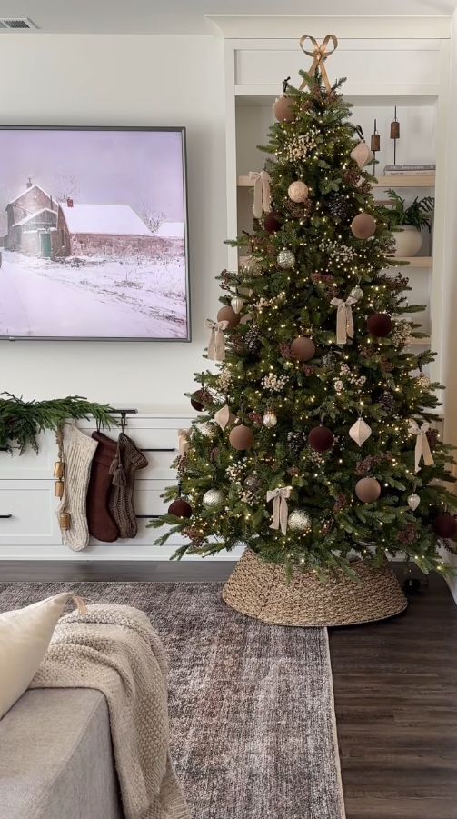 a living room with a christmas tree in the corner