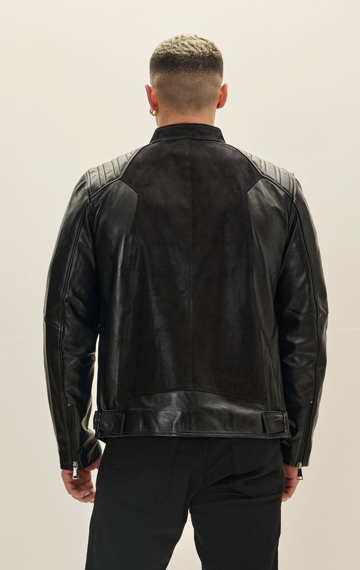 DETAILS Elevate any look with our signature varsity bomber jacket, exclusively handcrafted for Ron Tomson. Sleek black lambskin leather complimented by silver zipper details and utility pockets finish off a rebellious take on this classic silhouette. Step into a blend of timeless style and contemporary flair with our Essential Leather Bomber Jacket. Designed for both fashion-forward individuals and those who appreciate classic looks, this jacket is the ultimate statement in luxury and versatilit Black Leather Jacket With Zipper For Work, Black Leather Jacket With Padded Collar For Work, Edgy Black Leather Jacket For Business, Black Biker Jacket With Padded Collar For Work, Modern Black Leather Jacket, Luxury Black Biker Jacket For Biker Events, Luxury Black Biker Jacket For Events, Black Leather Jacket With Padded Collar For Business, Black Leather Jacket With Contrast Stitching For Fall