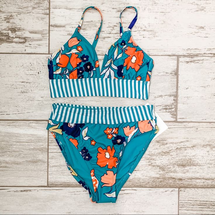 Size Small High Waisted Lined Blue Swimwear For Beach Season, Blue Lined Swimwear For Beach Season, Blue Lined Tankini For Poolside, Poolside Blue Lined Tankini, Summer Blue Lined Swimwear, Blue Lined Summer Swimwear, Blue Floral Print Tankini For Spring, Spring Lined Tankini For Pool, Blue Tankini For Spring Beach Party