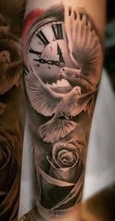 an arm with a clock and roses on it