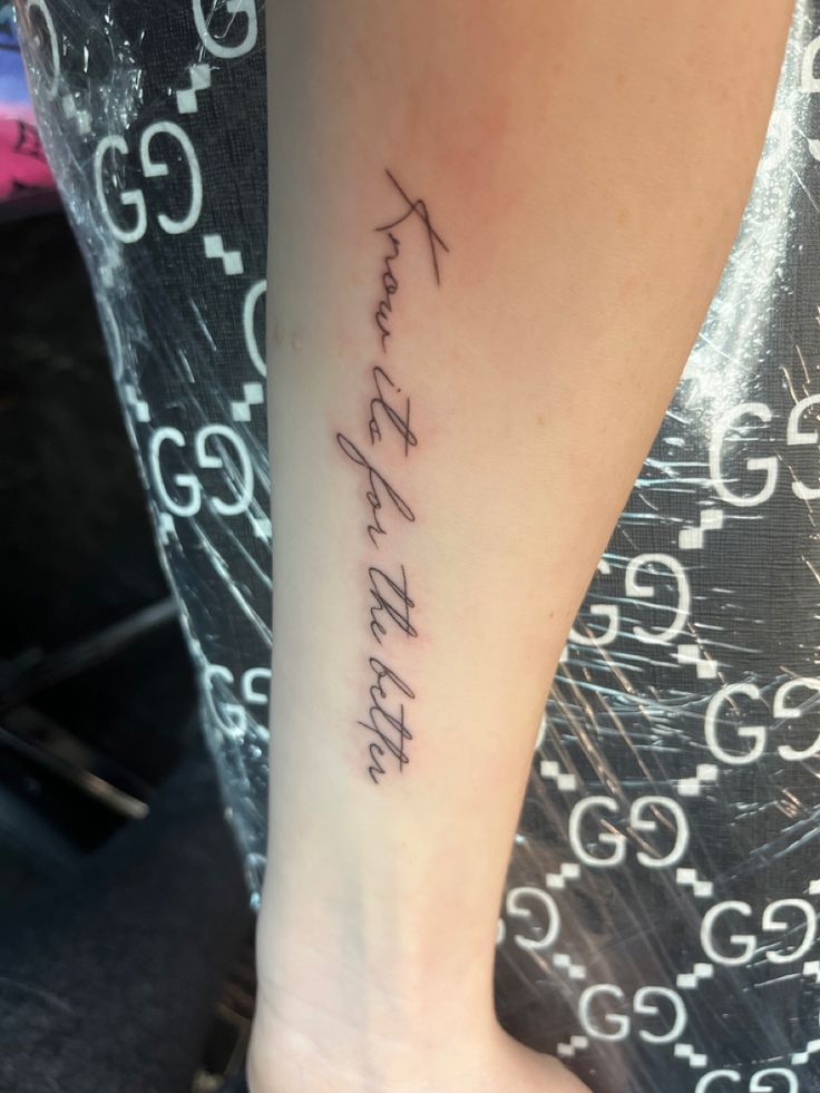 a woman's foot with a tattoo that reads harry potter on the side of her leg