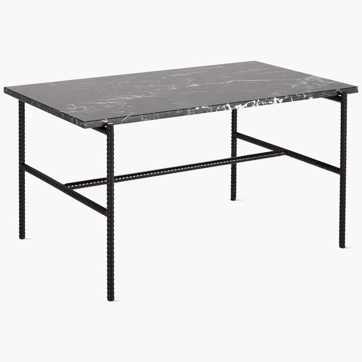 a marble top coffee table with black metal legs and an iron frame base, against a white background