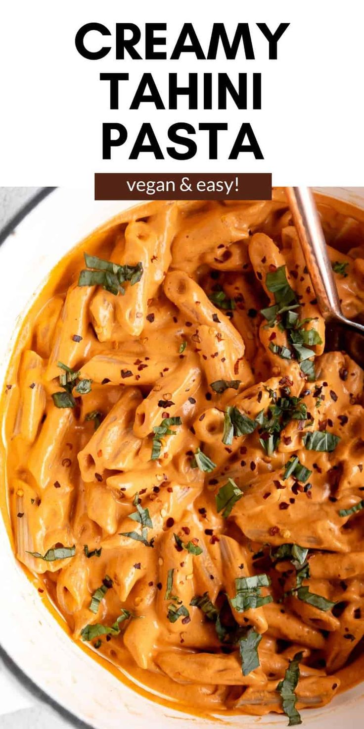 creamy tahini pasta in a white bowl with a spoon