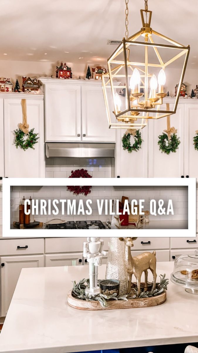 a christmas village q & a sign in the middle of a kitchen with white cabinets