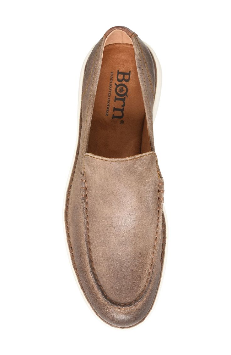 A burnished upper and streamlined silhouette distinguish a modern loafer grounded by a cushioned footbed and flexible sole. Cushioned footbed with arch support Leather upper/leather and textile lining/synthetic sole Imported Leather Slip-ons With Cushioned Footbed And Almond Toe, Slip-ons With Cushioned Footbed And Moc Toe, Cushioned Slip-on Leather Shoes In Swift Leather, Cushioned Swift Leather Slip-on Shoes, Cushioned Slip-on Swift Leather Shoes, Slip-on Swift Leather Shoes With Cushioned Footbed, Slip-on Leather Shoes With Cushioned Footbed And Almond Toe, Casual Leather Slip-on Shoes With Ortholite Insole, Slip-on Leather Shoes With Cushioned Footbed And Moc Toe