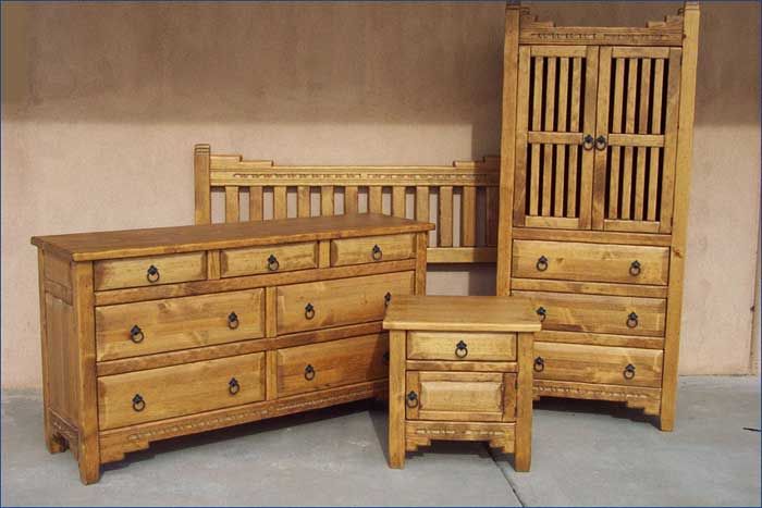 a set of furniture including a bed, dresser and armoire