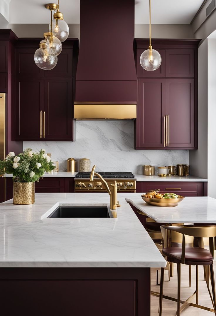 a kitchen with purple cabinets and marble counter tops, gold accents on the faucet