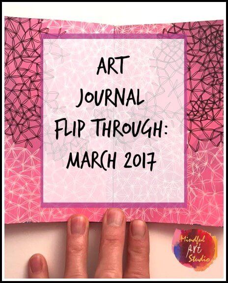 a person holding up a pink paper with the words art journal flip through march 2011