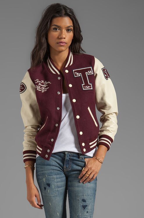 Women's True Religion Richie Varsity Jacket in Plum; Size Small. Description: * Shell: 80% wool, 20% polyamide.  * Sleeves: 100% cow leather.  * Lining: 100% poly.  * Button front closure.  * Side double welt pockets.  * Rib knit edges.  * Contrast color blocking.  * Leather sleeves and pocket trim.  * Embroidered logo and patches.  * Dry clean only.  SIZE and FIT: Modeled in size S. Model Measurements: Height 5'11", Waist 25", Bust 32, Hips 35". *** Approximate Measurements: Length (from mid co Sheepskin Coat Mens, Mens Leather Blazer, Leather Trench Coat Woman, Mens Leather Shirt, Suede Jacket Men, Letter Jacket, Leather Shorts Women, Leather Blazer Women, Women Leather Vest