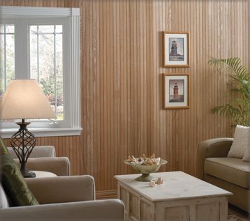 a living room with two couches and a coffee table in front of a window