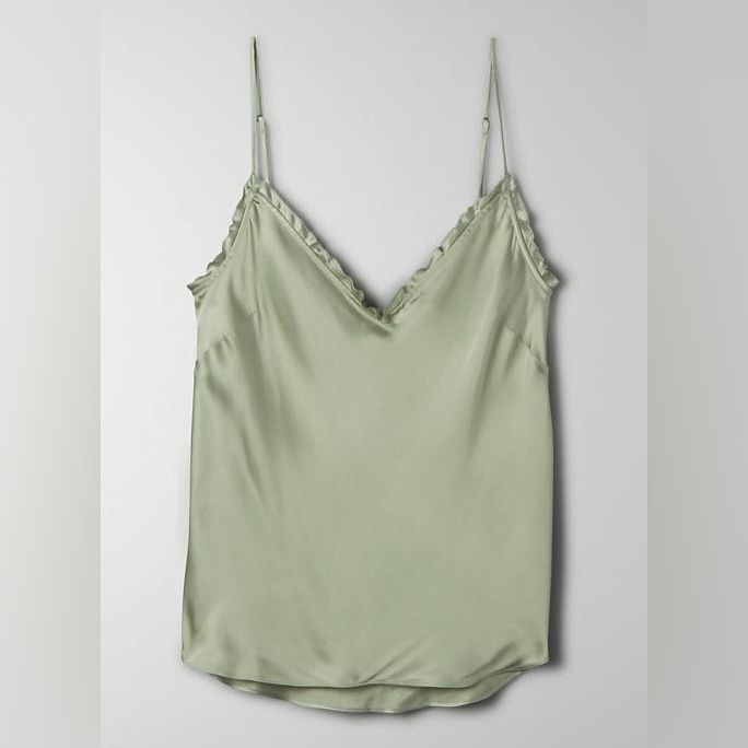 Wilfred Ruffle Camisole In Size Medium. Color: Silver Sage Green Never Worn, Doesnt Fit Me Right! Feminine V-neck Camisole With Ruffles, Fitted V-neck Camisole With Ruffles, Chic V-neck Ruffled Camisole, Fitted Tops With Delicate Ruffled Straps, Flirty Ruffled Summer Camisole, Fitted Ruffled Tank Camisole, Flirty Ruffled Camisole Tank Top, Flirty Ruffled Sleeveless Camisole, Flirty Ruffled Cami Tank Top