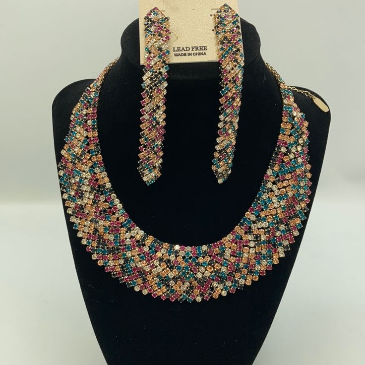 Brand New With Tags Matching Rhinestone Necklace & Earring Set In Gold Tone Setting Adjustable Lobster Clasp Beautiful Gift For Young Or Older Woman Multicolor Rhinestone Necklace With Sparkling Stones For Party, Multicolor Sparkling Crystal Jewelry, Sparkling Multicolor Crystal Jewelry, Multicolor Crystal Rhinestone Necklace With Sparkling Stones, Multicolor Crystal Jewelry With Sparkling Stones, Party Multicolor Bling Jewelry, Multicolor Rhinestone Wedding Jewelry, Elegant Multicolor Evening Jewelry, Elegant Multicolor Rhinestone Necklace For Gift