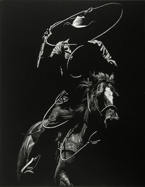 a black and white photo of a man on a horse with a lasso in his hand