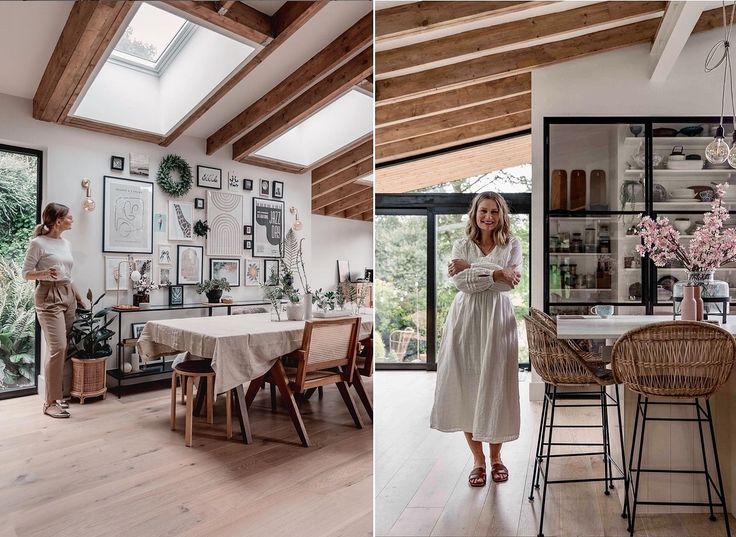 a woman standing in a kitchen next to a dining room table with chairs and pictures on the wall