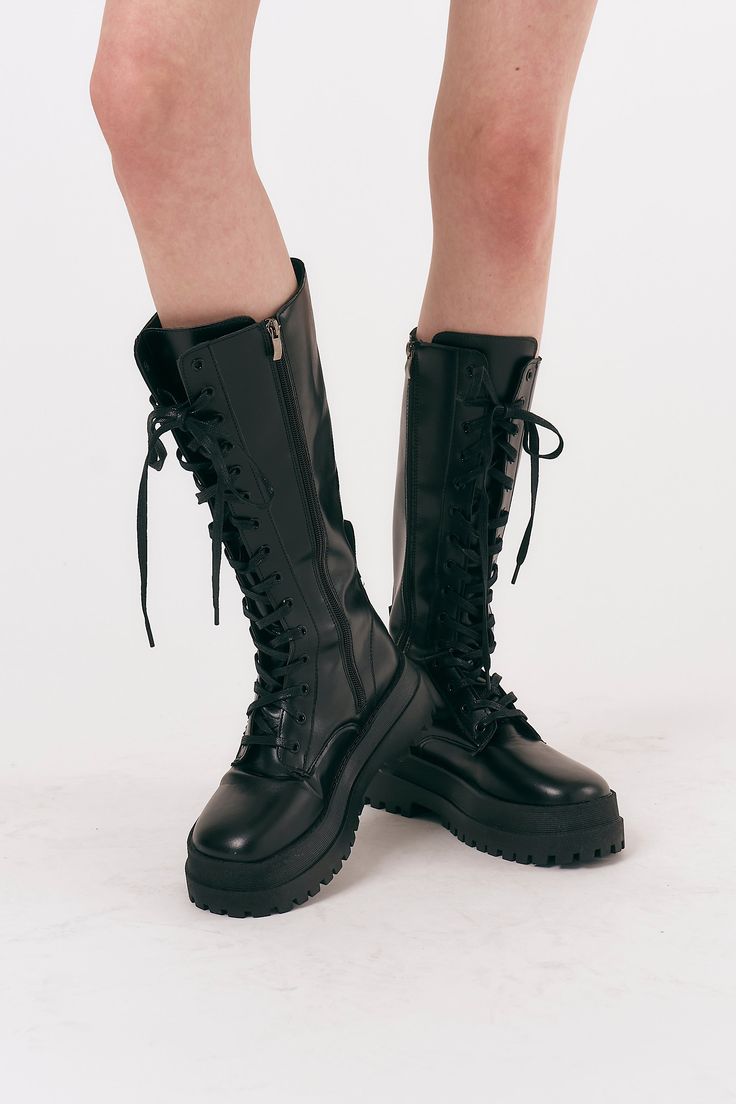 Milly Chunky Combat Boots - Hand picked by STORETS' stylists 100% Synthetic leather Edgy Black Knee-high Lace-up Boots, Edgy Black Knee-high Boots For Streetwear, Fall Knee-high Platform Boots For Concerts, Edgy Knee-high Boots With Round Toe For Streetwear, Fall Concert Knee-high Platform Boots, Edgy Round Toe Knee-high Boots For Streetwear, Knee-high Platform Boots For Fall Concerts, Trendy Knee-high Combat Boots For Streetwear, Black Boots For Spring Concerts