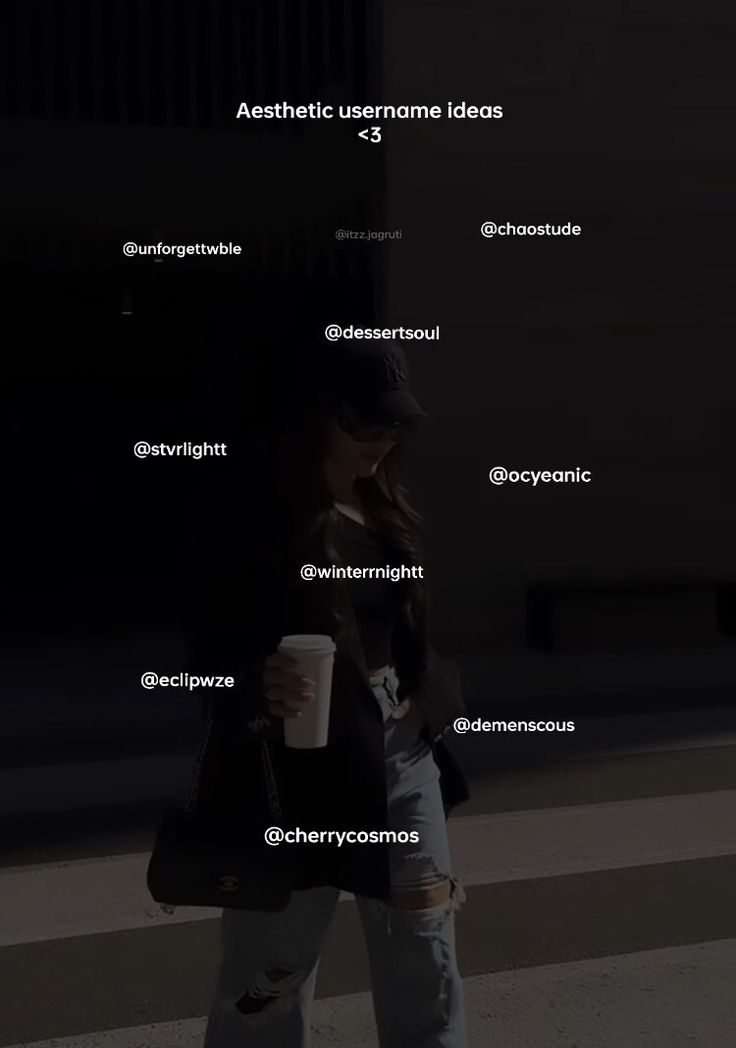 a woman walking down the street holding a coffee cup