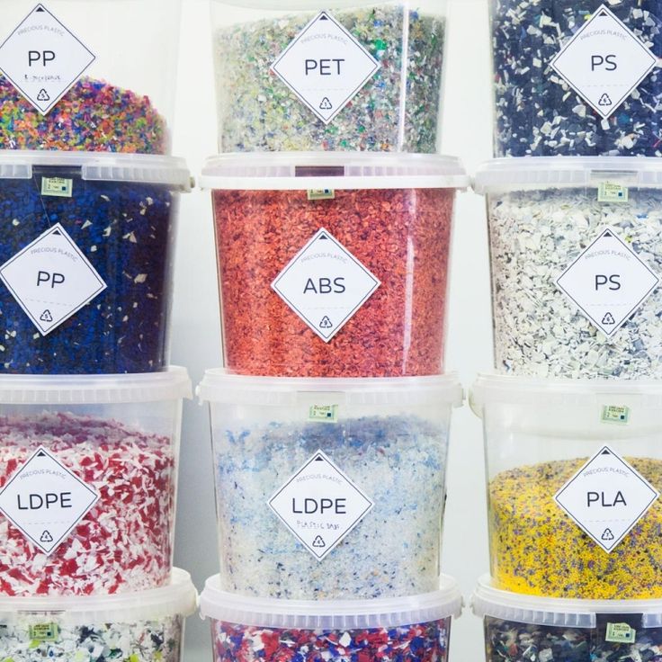 many different colored sprinkles in plastic containers on a white background with the words pde above them