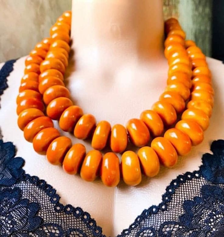 Hand made traditional Berber necklace. Lovely little necklace can be worn for ceremonies or other occasions. Necklaces With Large Beads As Festival Gifts, Unique Hand-strung Orange Necklace, Elegant Orange Hand-strung Necklace, Yellow Necklace For Festival Gifts, Yellow Necklace For Festivals And Gifts, Traditional Yellow Necklaces For Gifts, Traditional Yellow Necklace As Gift, Traditional Yellow Necklace For Gift, Amber Necklace With Wooden Beads For Gifts