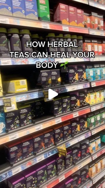 a store shelf filled with teas and boxes