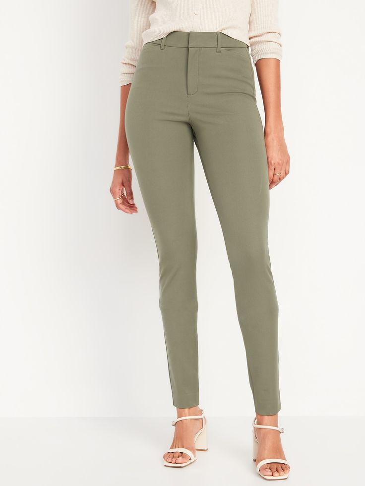 contoured waistband hook-and-bar closure belt loops zip fly front pockets faux-welt back pockets sits at belly button fitted hip and thigh hits below ankle 30" regular inseam 28" petite inseam 34" tall inseam models are approx.  5'9" and wear sizes s (4), l (12), and xl (18)machine wash according to the care instruction label cotton 55% spandex 8% rayon 37% Fitted Mid-rise Pants With Button Zip Fly, Fitted High-waist Jeggings With Pockets, Fitted Mid-rise Bottoms With Zip Fly, Fitted High Rise Bottoms With Zipper Closure, High Rise Elastane Pants With Pockets, Fitted Bottoms With Zip Fly For Fall, Fitted Bottoms With Button Zip Fly And Tapered Leg, High Rise Fitted Jeggings With Zipper Closure, Fitted High-rise Jeggings With Zipper Closure