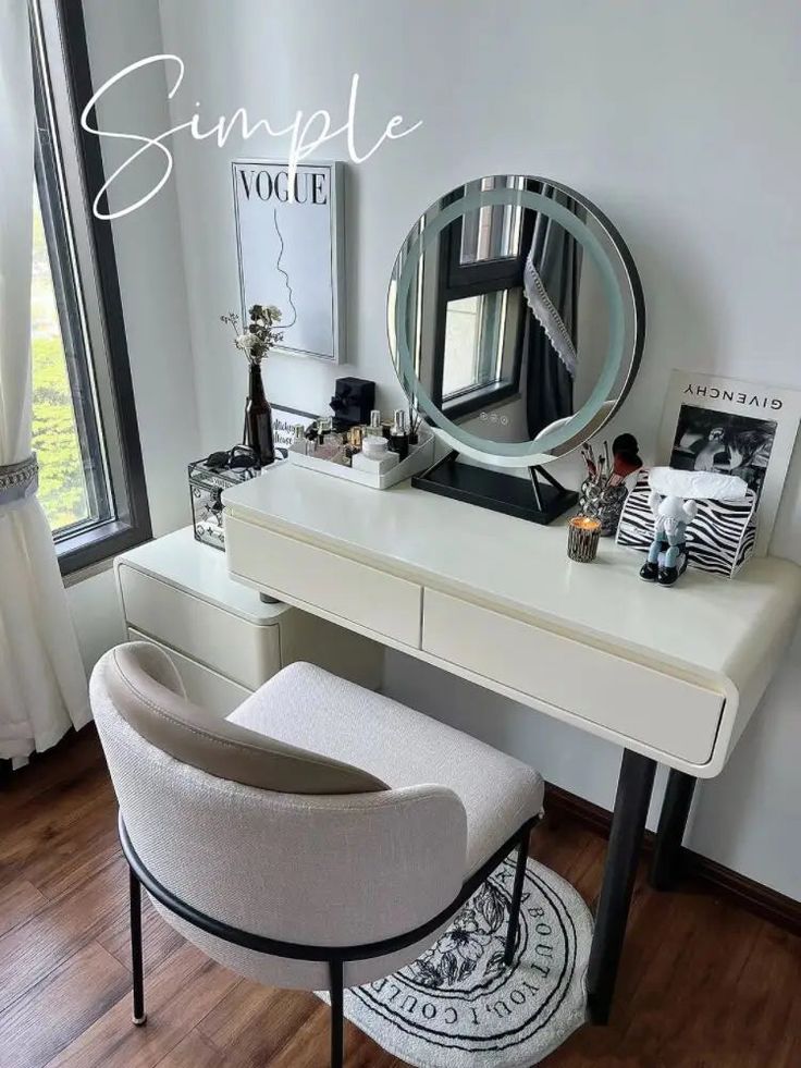 a white desk with a mirror and stool