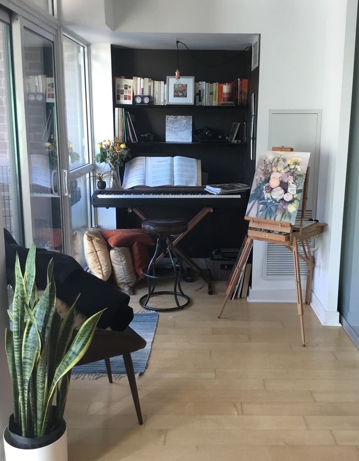 a living room filled with furniture and a piano