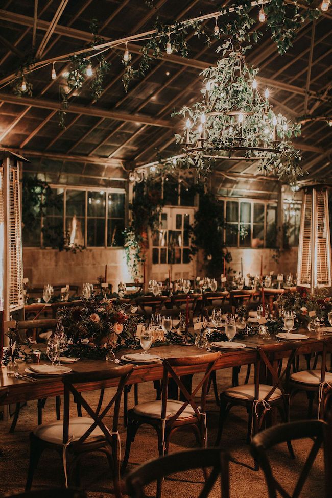 a dining room with tables and chairs set up for a formal function at the reception