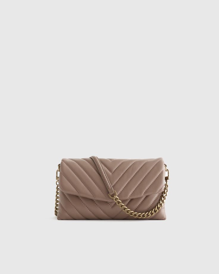 Think of this as the cherry on top of your evening look. Made of ultra-soft 100% Italian leather with a stylish quilted design, this piece will elevate any ensemble. And it boasts six card slots and a center zip pocket to hold all the essentials. Wear as a chic crossbody or remove the detachable chain to make a cute clutch. Taupe Bag, Quilted Wallet, Dark Taupe, Quilted Crossbody Bag, Classic Bags, Sheep Leather, Cherry On Top, Wallet Bag, Perfect Bag