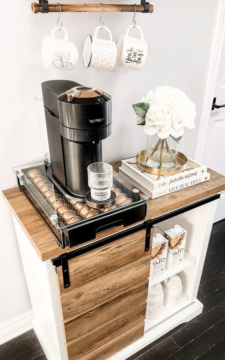 a coffee maker on top of a wooden counter