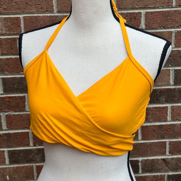 New With Tags Airy Wraparound Bikini Top In Gold Golden Yellow Color. Size Xl. Packaged And Ready To Ship! G021 Please See Other Listings In Closet To Bundle For A Better Deal! Yellow Halter Neck Top For Vacation, Yellow Triangle Halter Top For Spring, Spring Yellow Triangle Halter Top, Yellow Sleeveless Halter Top For Beach, Yellow Tops For Poolside Spring Season, Casual Yellow Halter Top For Vacation, Casual Yellow Halter Top For The Beach, Yellow Stretch Tankini For Sunbathing, Yellow Stretch Tankini For Beachwear