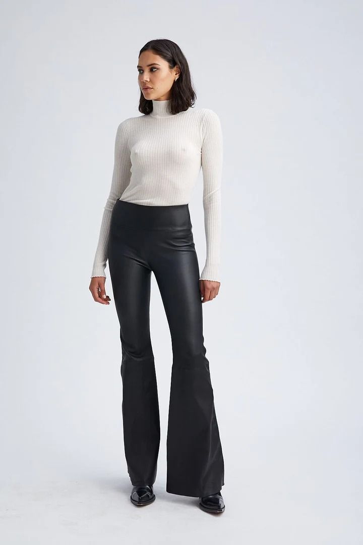 ULTRA FLARE Black Modern Fitted Wide Leg Leather Pants, Sleek Flare Bottoms For Night Out, Modern Flare Pants For Fall, Elegant Flare Leather Pants For Fall, Sleek Flare Pants For Fall, Sleek Flare Bottoms In Elastane, Sleek Fitted Leather Pants, Sleek Fitted Full-length Leather Pants, Elegant High-cut Leg Fitted Pants