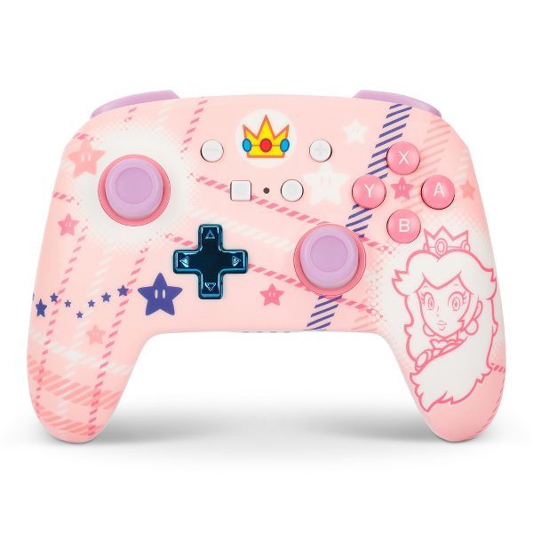 a pink nintendo wii game controller with princess design on the front and side buttons,