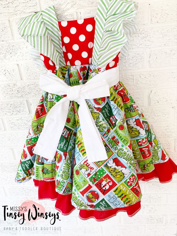 Follow link to purchase ! Green Christmas Dress-up Dresses, Green Christmas Dress For Dress-up, Green Christmas Dresses For Dress-up, Fitted Cotton Dresses For Holiday, Green Christmas Dress For Holiday Dress-up, Green Christmas Holiday Dress For Dress-up, Green Cotton Winter Dresses, Christmas Cotton Dress With Ruffles, Christmas Sleeveless Ruffled Holiday Dress