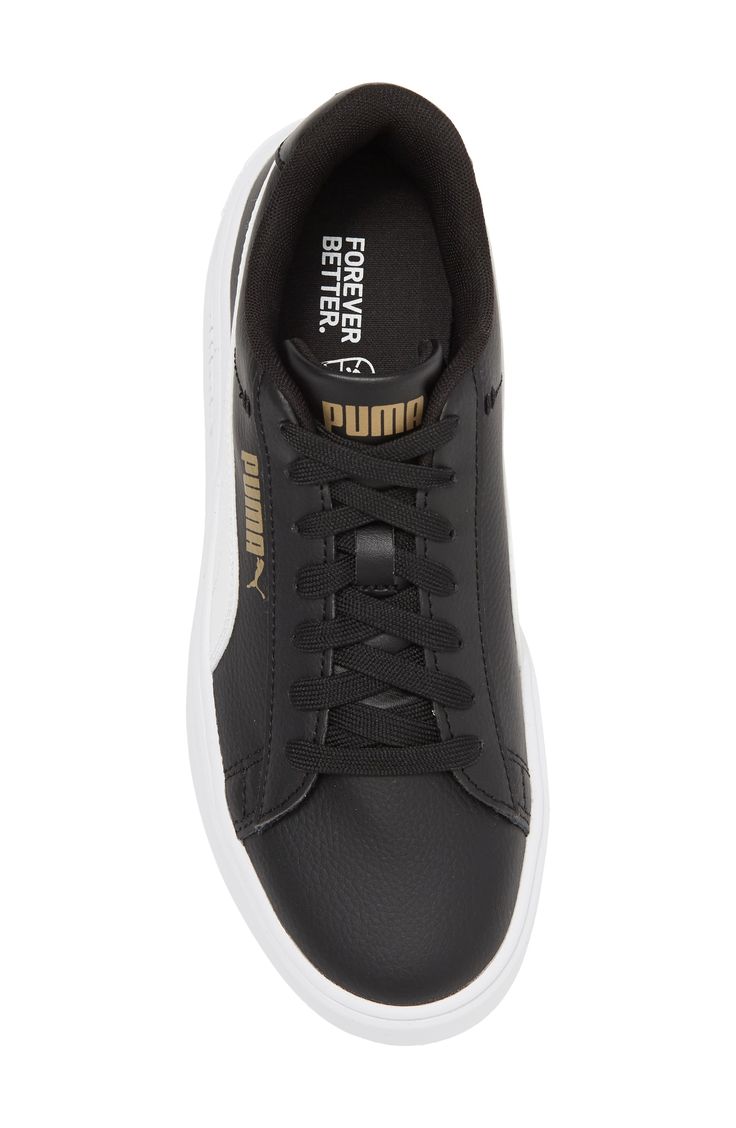 Give your wardrobe a boost with this sporty leather sneaker featuring comfortable cushioning and a platform sole. 1" platform Round toe Lace-up ties Padded collar Platform sole Leather upper/textile lining/rubber sole Imported Black Platform Sneakers With Embossed Logo And Round Toe, Black Platform Sneakers With Embossed Logo, Black Leather Platform Sneakers With Embossed Logo, Synthetic Sneakers With Embossed Logo For Sports, Sports Sneakers With Embossed Logo In Synthetic Material, Sporty Lace-up Platform Sneakers With Embossed Logo, Sports Sneakers With Embossed Logo In Synthetic, Sporty Embossed Logo Lace-up Platform Sneakers, Sports Platform Sneakers With Embossed Logo