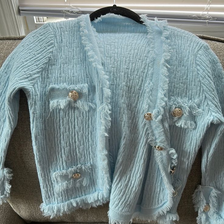 Purchased At A Boutique Last Month Never Worn Elegant Blue Knit Cardigan, Chic Blue Knit Outerwear, Light Blue Knit Cardigan For Spring, Chic Blue Long Sleeve Cardigan, Chic Blue Cardigan For Fall, Elegant Light Blue Sweater For Spring, Elegant Light Blue Spring Sweater, Blue Knit Cardigan For Spring, Light Blue Cardigan