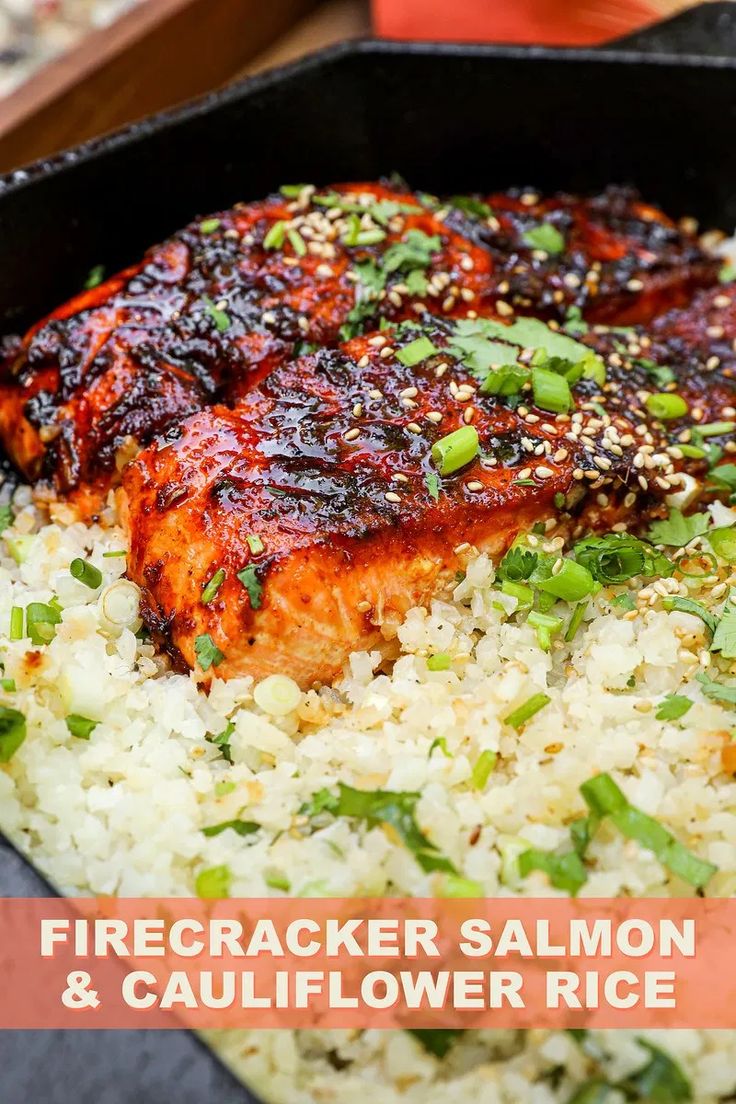 salmon and cauliflower rice in a cast iron skillet with the words, firecrackerr salmon & cauliflower rice